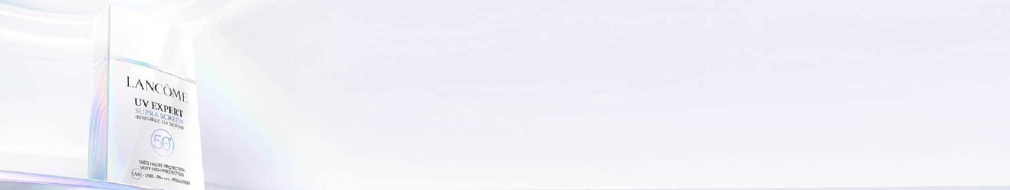 Alt text: A bottle of Lancome overnight skincare product against a minimalist light background.