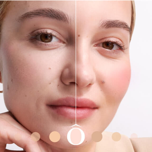Close-up of a woman's face, featuring makeup on one side and natural skin on the other, showcasing the contrast between the two looks. She has a neutral expression and is wearing a light-colored top.