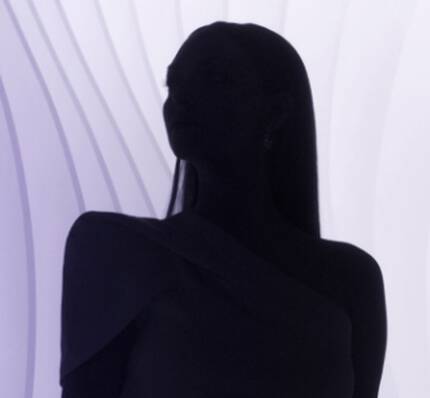 A silhouette of a woman with long hair, set against a softly lit, wavy purple background.